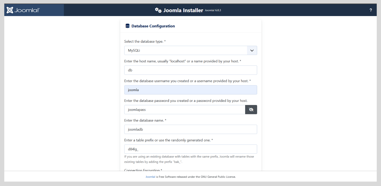 Joomla database configuration screen showing exact Docker values